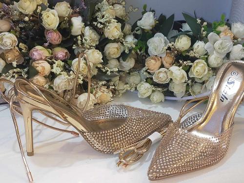 Crystal embellished logo slingback Heels