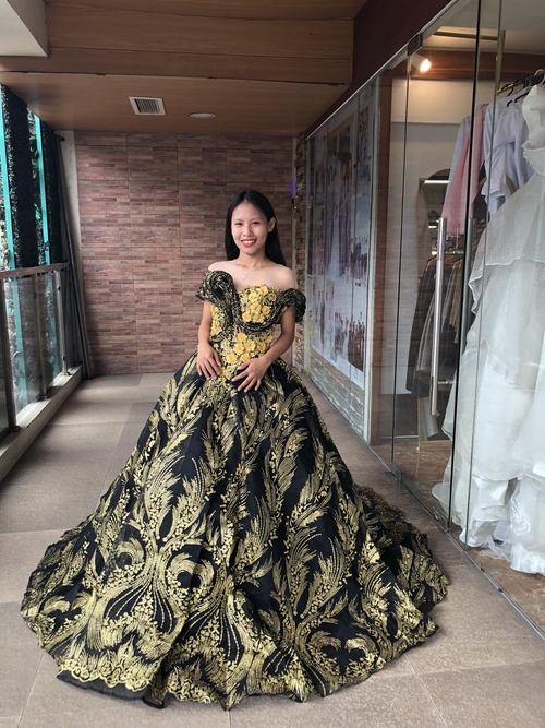 Enchanted Black Gold Glittery Ball Gown with Palm & Flower Design